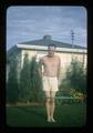 Bob Henderson in shorts with hula hoop, Corvallis, Oregon, September 1958