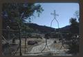 Gate, wheels and cross design, E. Evans Creek Rd., Wimer