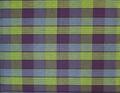 Textile panel of chartreuse, light blue, and violet textured plaid in a cube pattern