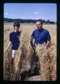 Margie Stiger and Warren Kronstad holding wheat, North Willamette Experiment Station, Oregon State University, Aurora, Oregon, July 1972