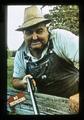 Farmer with gun guarding water, Oregon, 1976