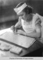 Candy Kitchen, Berea College: young woman making molded candy