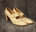 Mary Janes of white leather with open-work weave on vamp