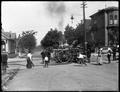 Horse-drawn fire engine.