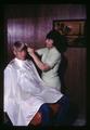 Memorial Union barber shop customer and employee, Oregon State University, circa 1969