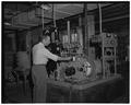 Dr. Milosh Popovich in engineering department, 1951