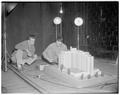 Professor Clayton and Vesta St. Clair studying wind movements, 1955