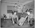 State Police School instructors demonstrating spinal immobilization [?]