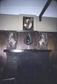 View of gold room fireplace in bar with K's carvings on the wall