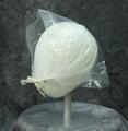 Head scarf of clear plastic with ivory silk ribbon ties attached at rivets