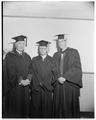 President Strand (right) with a faculty member and student on commencement day, June 1956