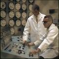 Technicians working in the Radiation Lab