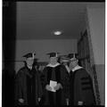 President Jensen (left) with faculty colleagues on commencement day, 1962