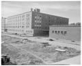 New men's dorm and cafeteria in final stages of completion, August 1957