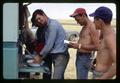 Combine crew washing up for lunch, Hawkins Ranch, Umatilla County, Oregon, circa 1970