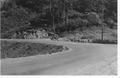 Highway 101 at Cape Perpetua at the mouth of Cape Creek.  The early pickup truck sits at the entrance of the road entering Cape Perpetua Campground.