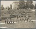 OAC cadets standing in formation near the Administration Building