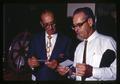 Clive Stevenson and Fred Quick at coin show, Roseburg, Oregon, circa 1970