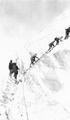 Climbers crossing crevasse on Mt. Hood