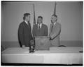 Lloyd Williams, Rotary Foundation student, graduate in Animal Husbandry, Dick Hansen, President of Corvallis Rotary Club, and President Strand, February 1954