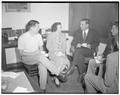 Congressman and Mrs. Walter Norblad are guests of Memorial Union hospitality committee and Jim Dunn, Memorial Union president, following forum talk, October 18, 1950