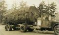 "One of Our Logs," large log on a truck