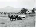 Wagon hauling packed fruit from packing house to railroad, Hillcrest Orchard near Medford, Oregon