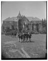 ROTC group marching in front of Education Hall, circa 1953