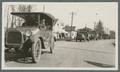 US Army staff car leading truck parade, circa 1920