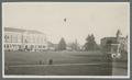 Campus view of bandstand and Pharmacy Building, circa 1920