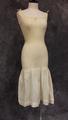 Full slip of ivory cotton with tunic-length ribbed knit top that extends to knee-length