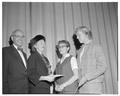Senator Richard L. Neuberger and Maurine Brown Neuberger giving Neuberger Scholarship to Merle Wright and Judy Newman, 1959