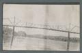Truss bridges viewed from river, circa 1910