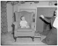 "Practice baby" Charles of Withycombe House photographed at Kent House before being returned home, July 1954