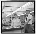 Jean Saubert, OSU student and Olympic skiing medalist, with a faculty member in the laboratory, July 1964