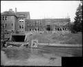 Addition to Ainsworth School, Portland, under construction, early stage. Construction materials in foreground. Original building at left.