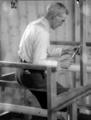 Samuel Clark, loom maker, at work