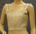 Camisole of ivory cotton eyelets with narrow satin ribbons woven through entire top horizontally