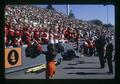 Marching band in stand with Rally Girl, Oregon State University, Corvallis, Oregon, circa 1972