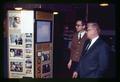 Larry Boersma and Loren McKinley examining OSU exhibit at Oregon Museum of Science and Industry, Portland, Oregon, January 1971