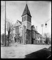 Grace Memorial Episcopal Church, at corner of 17th and Weidler, Portland. Houses in background, street in foreground.