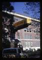 Van hoisted to 3rd floor of Agricultural Hall to move Microbiology equipment, Oregon State University, Corvallis, Oregon, circa 1970