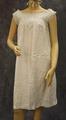 Nightgown of white linen with yoke of tucked and eyelet embroidered linen