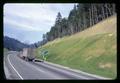 Grassed embankment and truck along highway near Azalea, Oregon cutoff, 1967