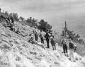 Mountain climbers standing on a mountainside