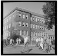 Passing time in front of Commerce Hall