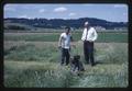 Pairoj Buangsuwon and Robert W. Henderson harvesting forage test plots, 1966