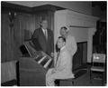 Music faculty member Tom Roberts tests the new carillonic bells in the Memorial Union, October 1959