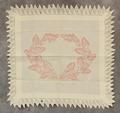 Table Scarf of ivory cotton with faded red chain stitch leafy vine design at the center