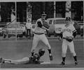 Steve Lyons throws to 1st base